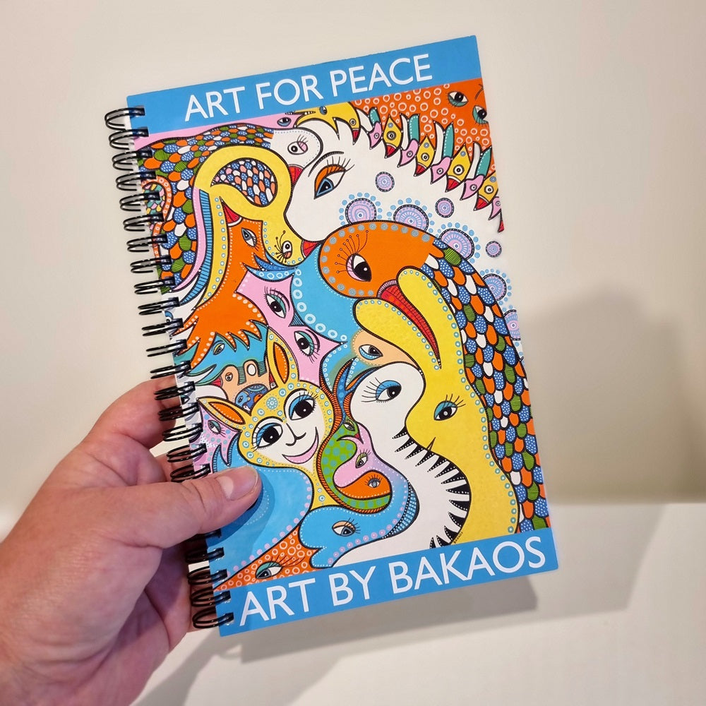 Notesbog - Art for Peace - med BAKAOS-citat på dansk